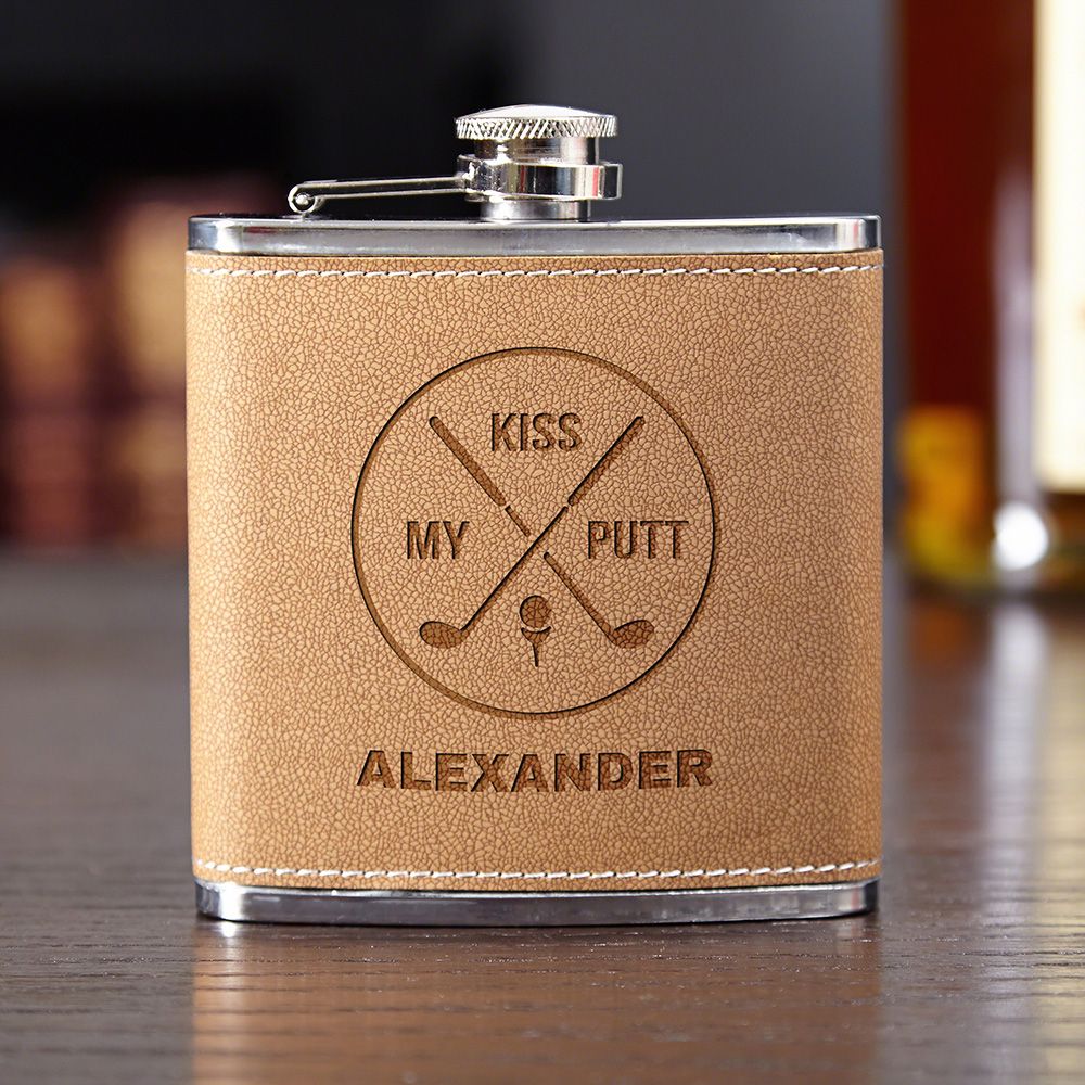 Personalized flask made from Stainless steel and leather-wrapped, engraved golf tools, your chosen name, and the phrase "Kiss my putt"