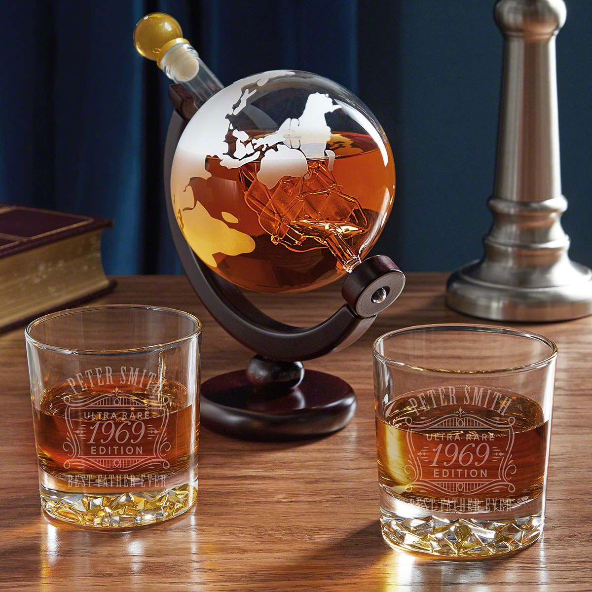 an ultra rare edition personalized globe whiskey decanter made of high quality hand-blown glass reflects the colors of your whiskey is an ideal space gift