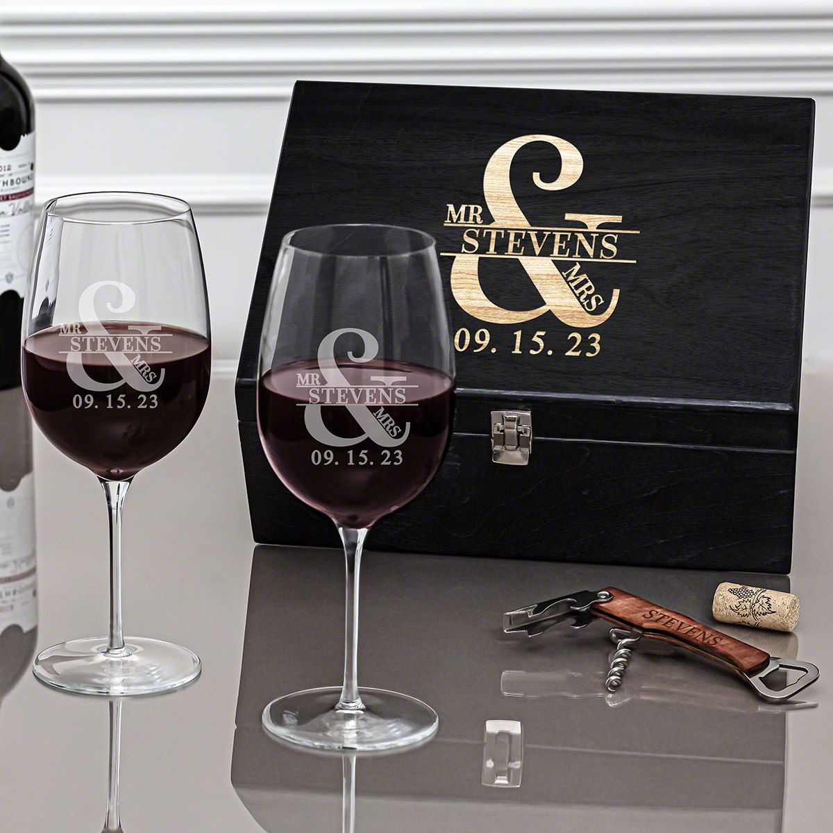 Two wine glasses in a box engraved with his name and your wedding day will make him cry.